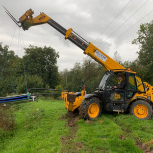 Thermal Earth installing sealed collector pipework beside a suitable water source