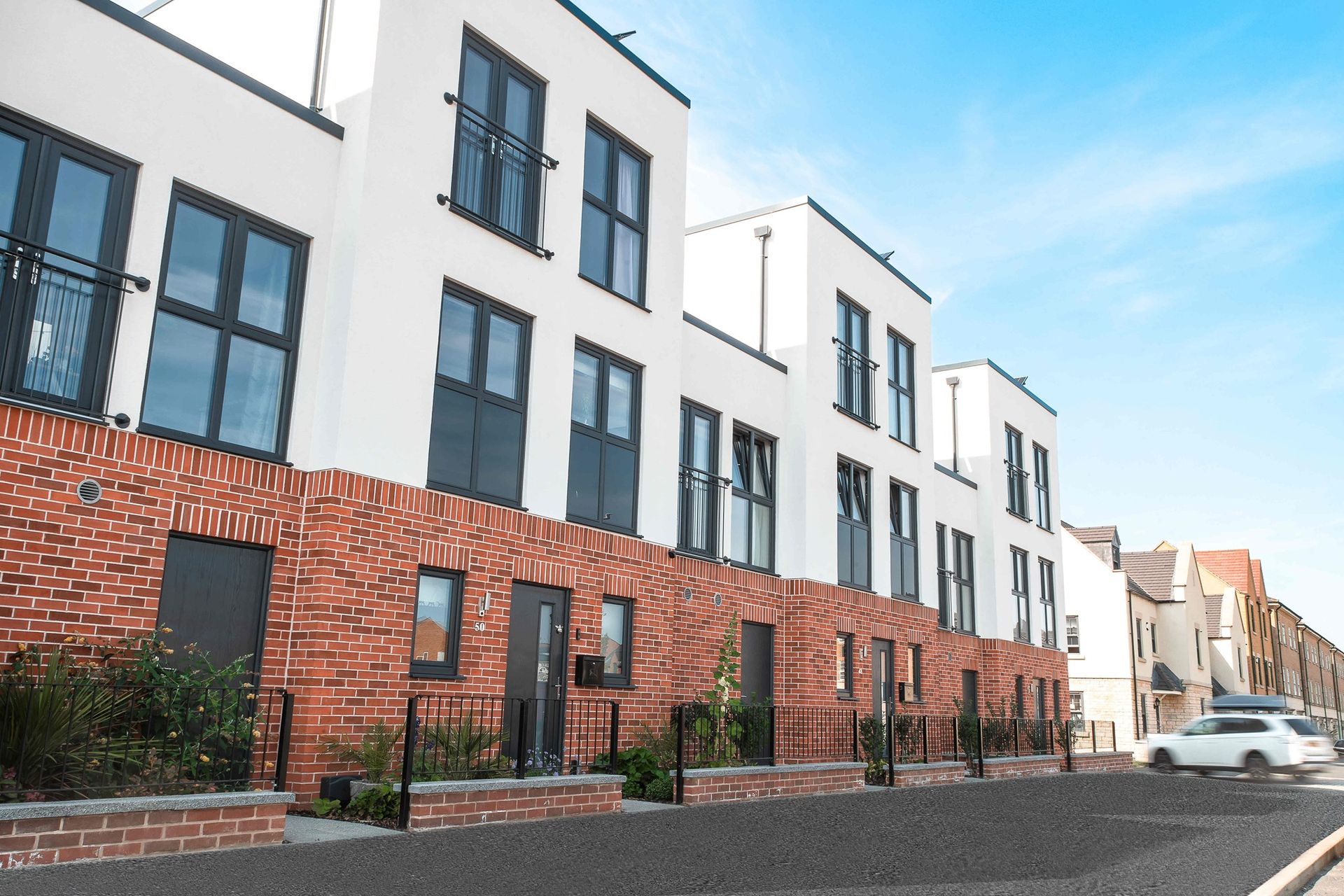 Modern three-storey new-build terraced homes