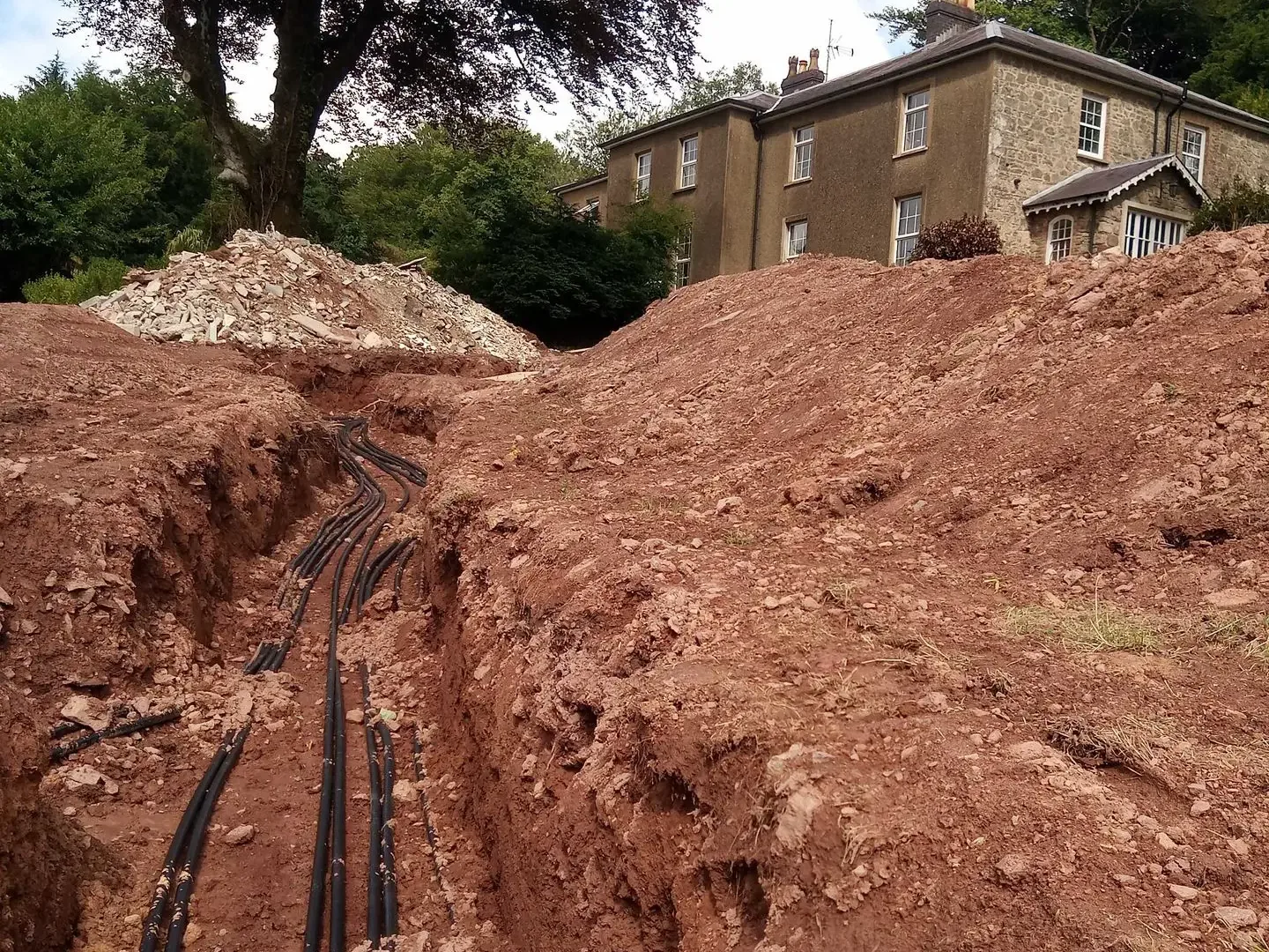 Ground collector trench and pipework installed at Cilrhiw Country House